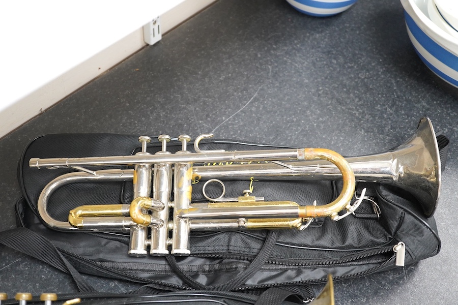 Three student trumpets by Beltone, etc. in soft cases and a cased Boosey & Hawkes trombone. Condition - poor to fair, all play